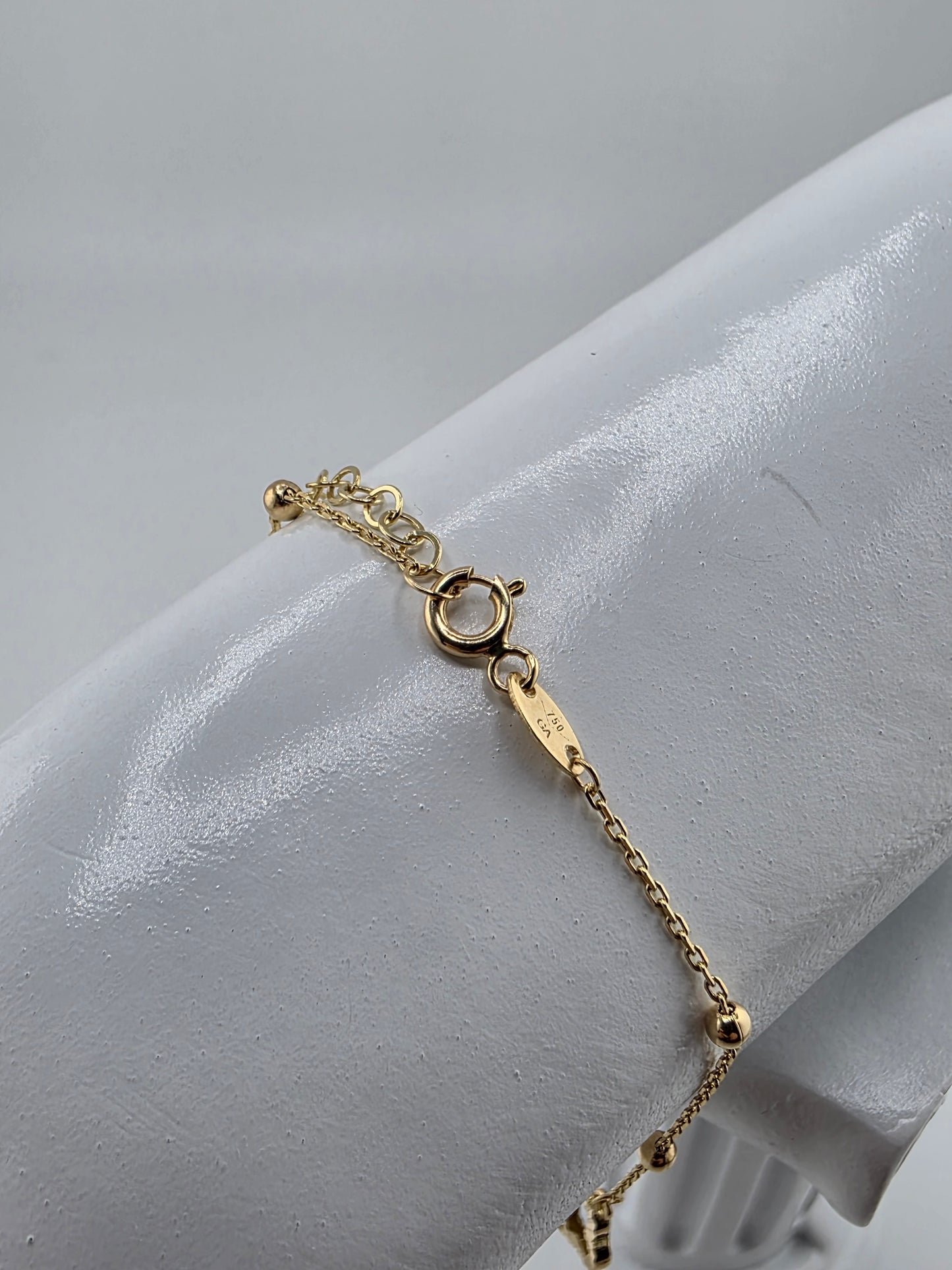 Golden clover bracelet with Turkish evil eye