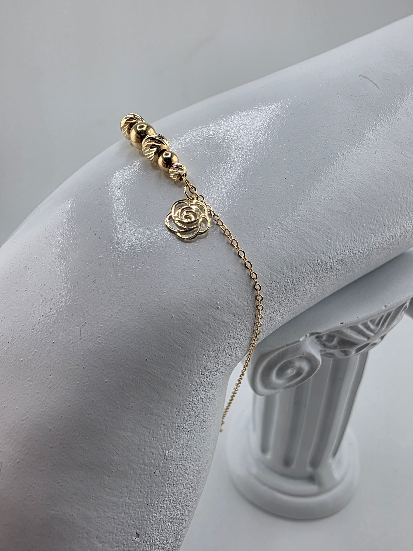 Bracelet with diamond dial and flower charm