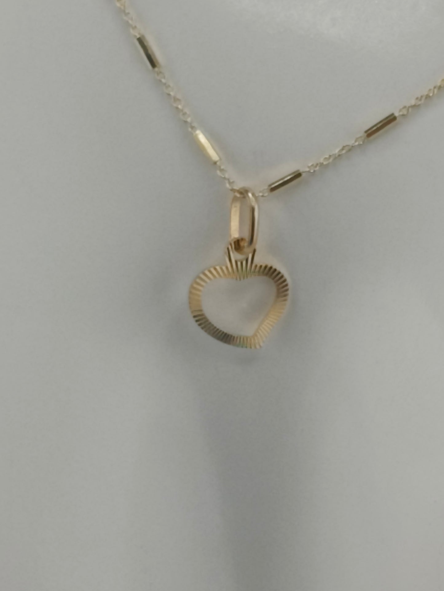 Beveled heart pendant