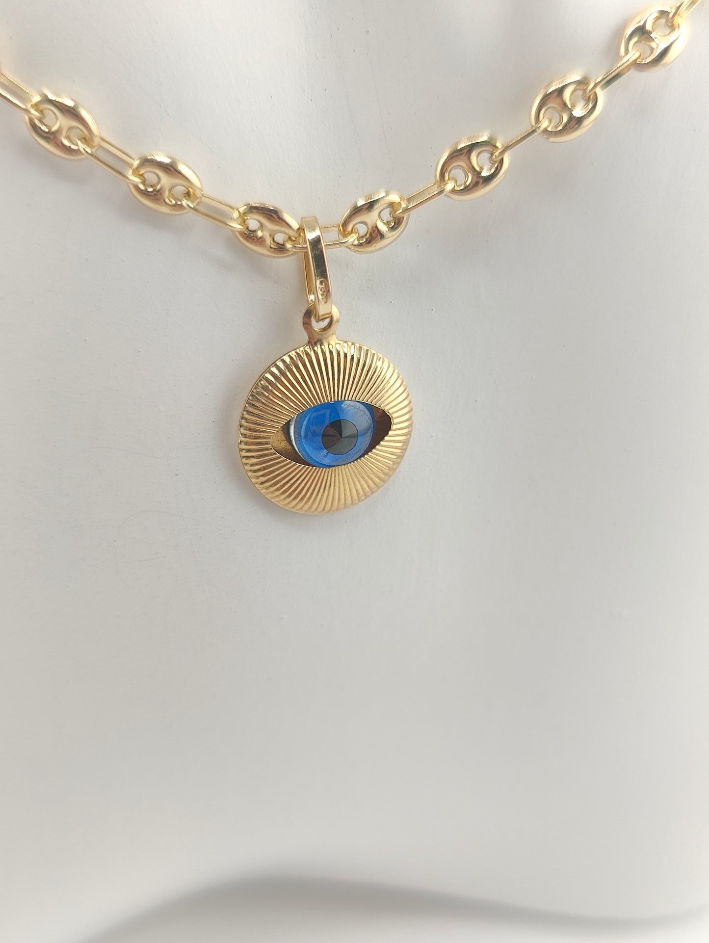 Golden eye pendant