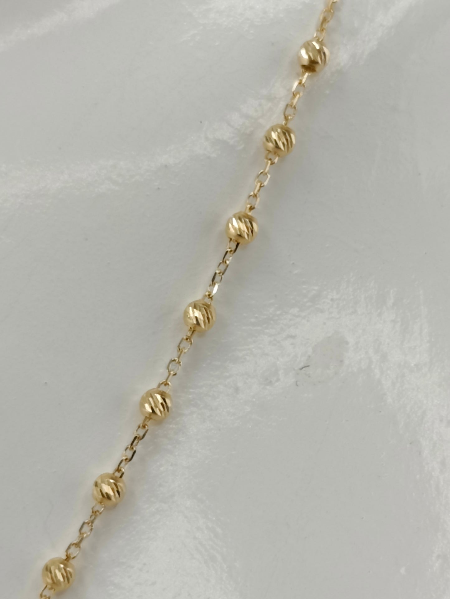 Diamond-coated rosary spheres