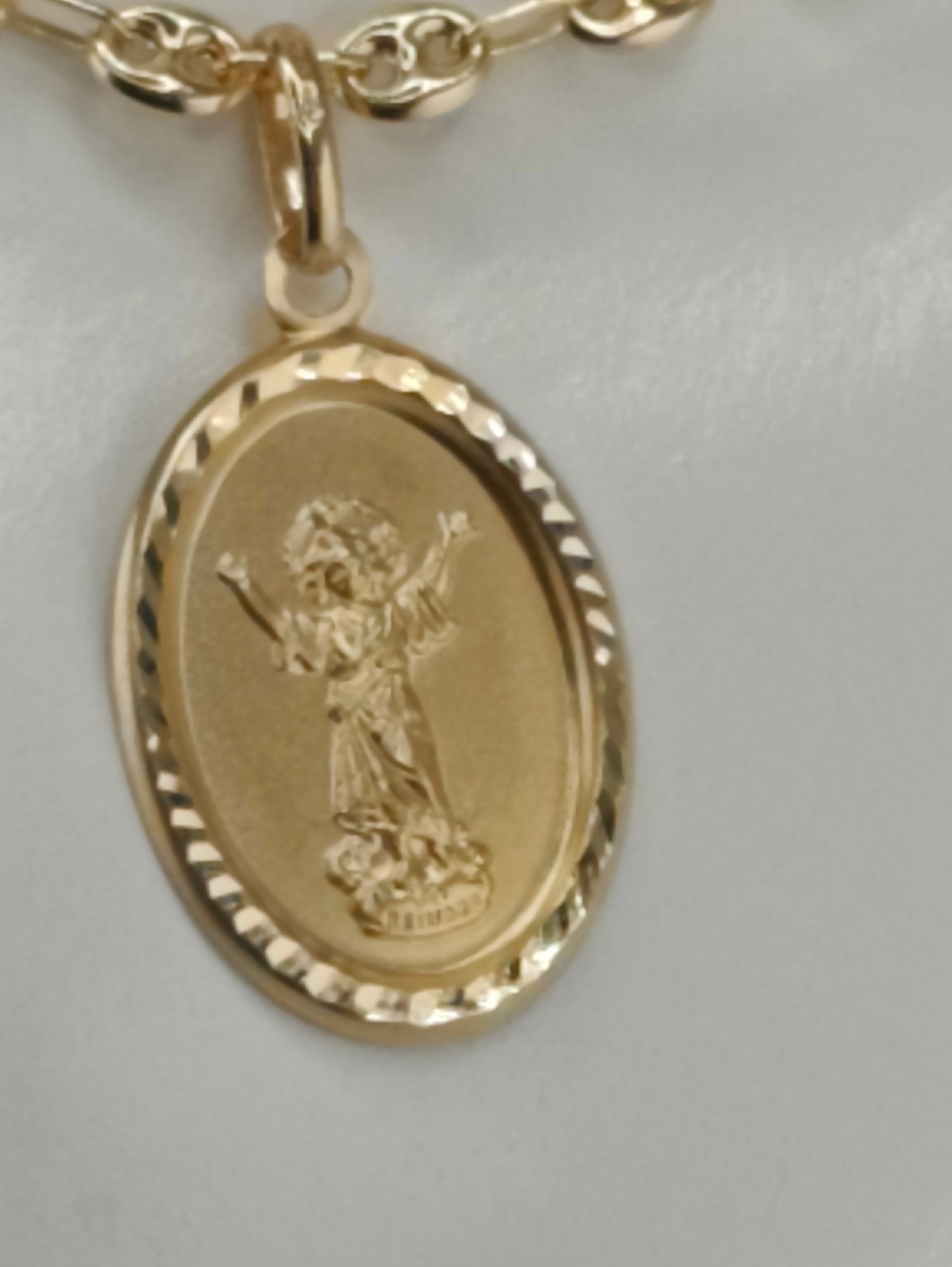 Divine child gold pendant