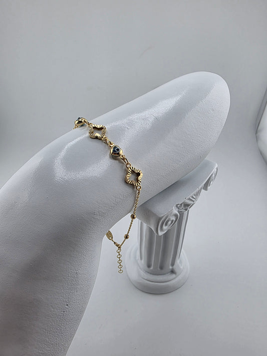 Golden clover bracelet with Turkish evil eye