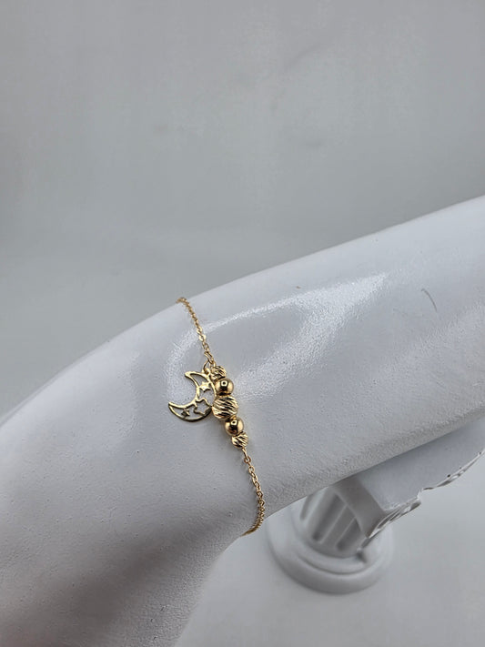 Diamond sphere bracelet with moon pendant