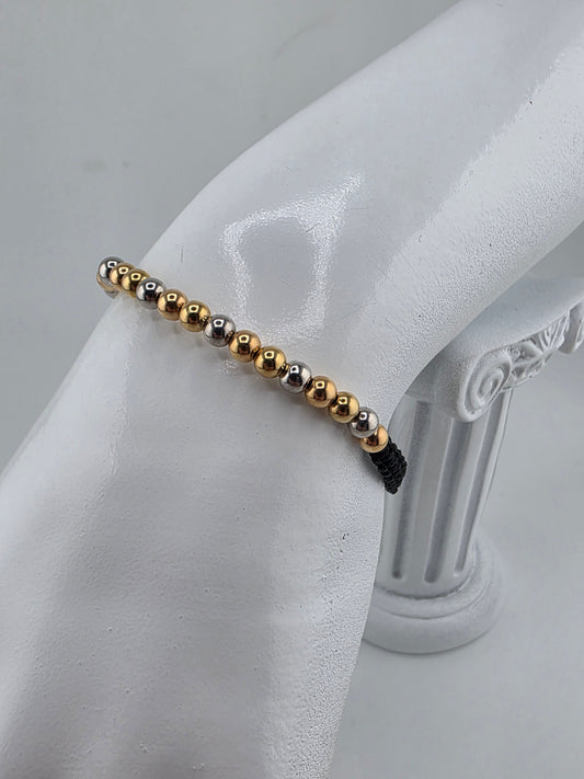 Bracelets with 3 gold spheres