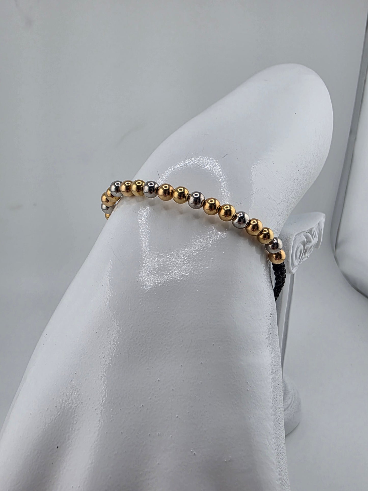 Bracelets with 3 gold spheres