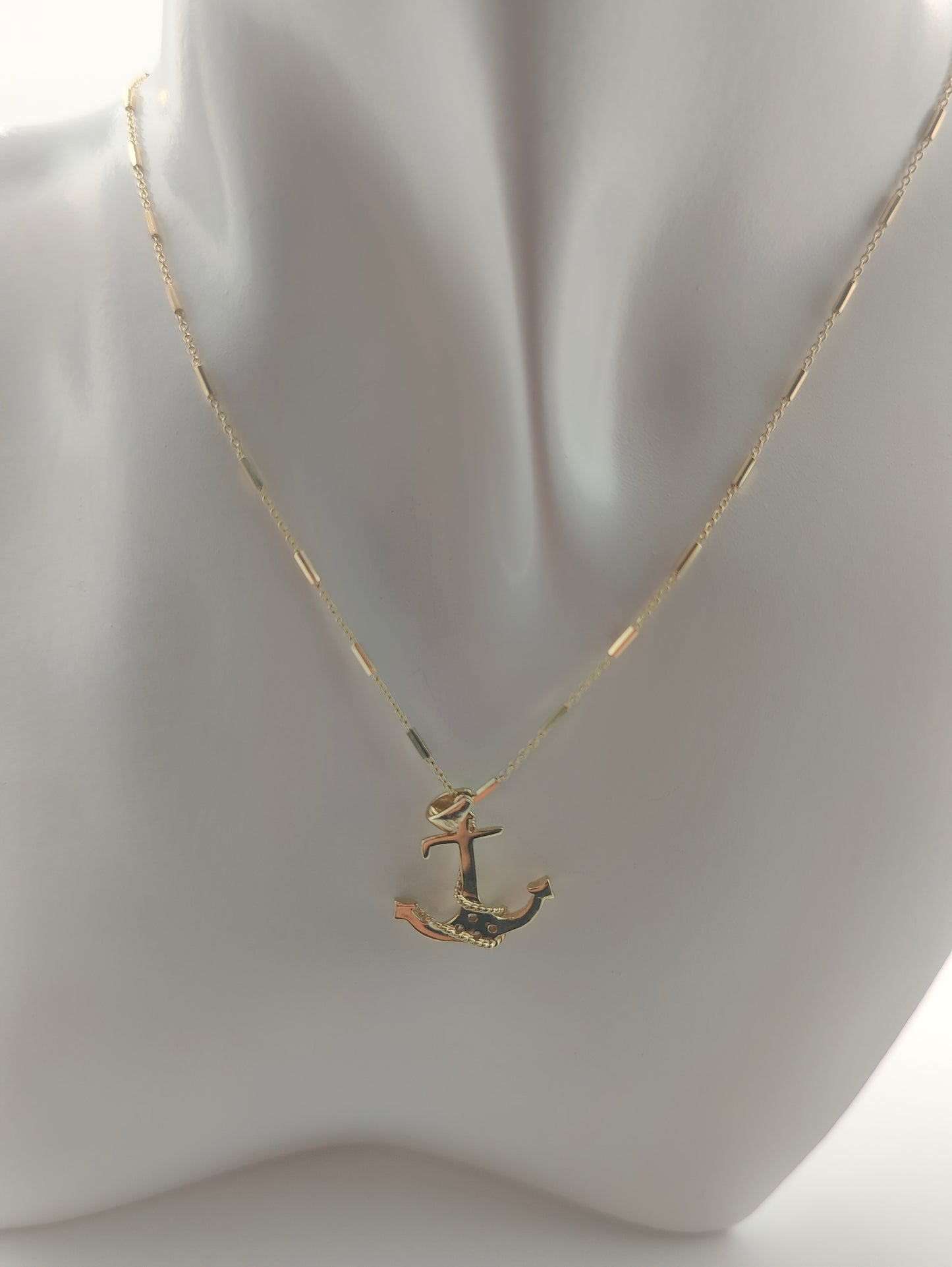 Golden anchor pendant