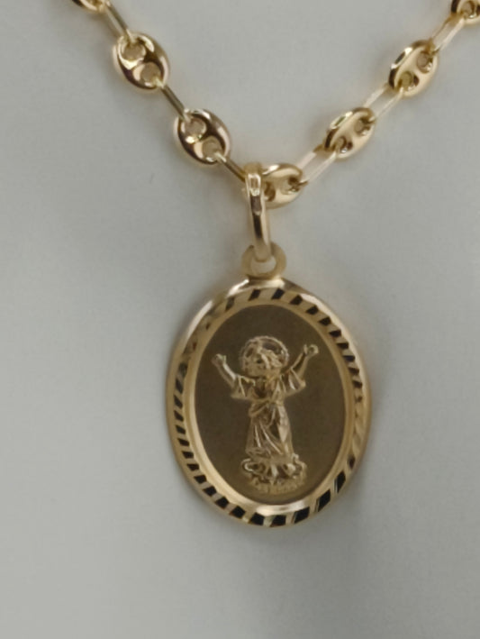 Divine child gold pendant
