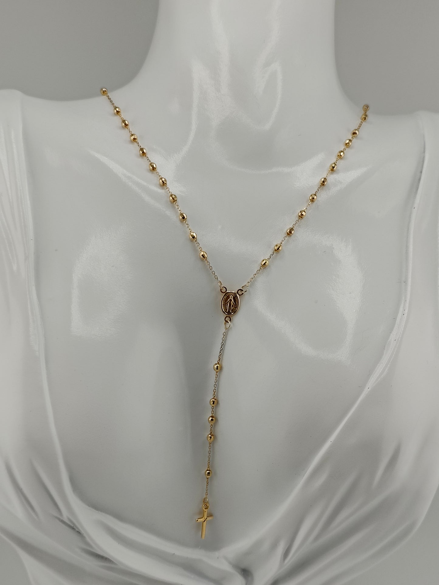 Rosary of vice-shaped spheres