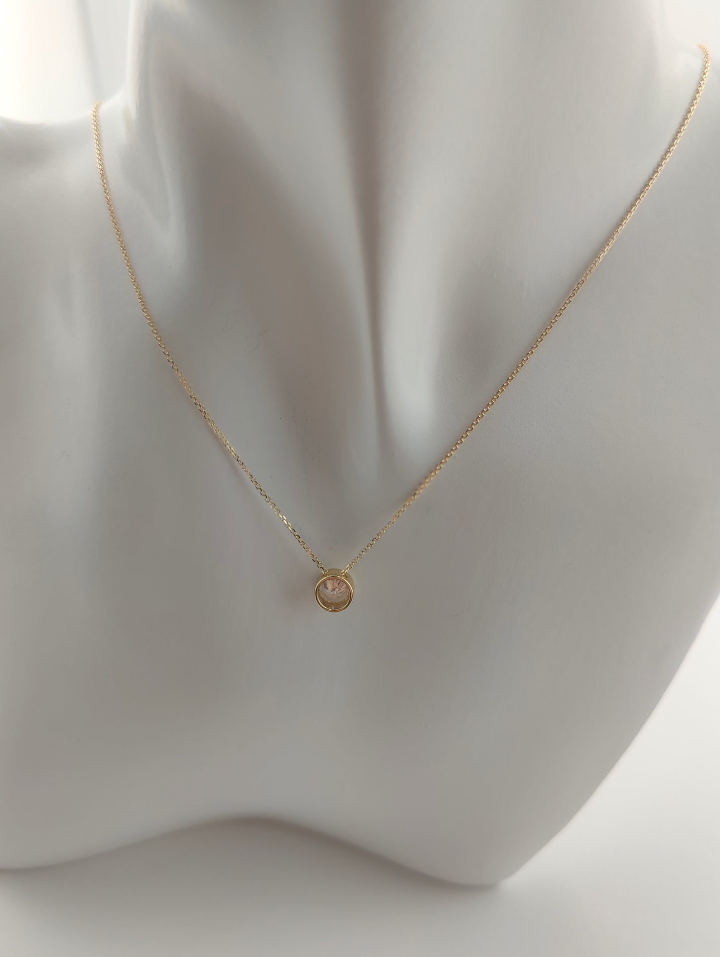 Golden chain with light drop