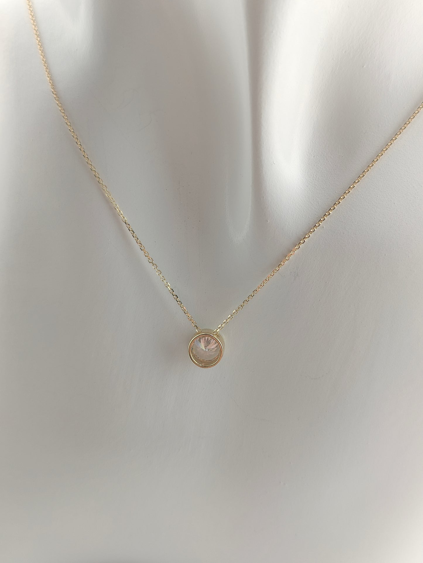 Golden chain with light drop