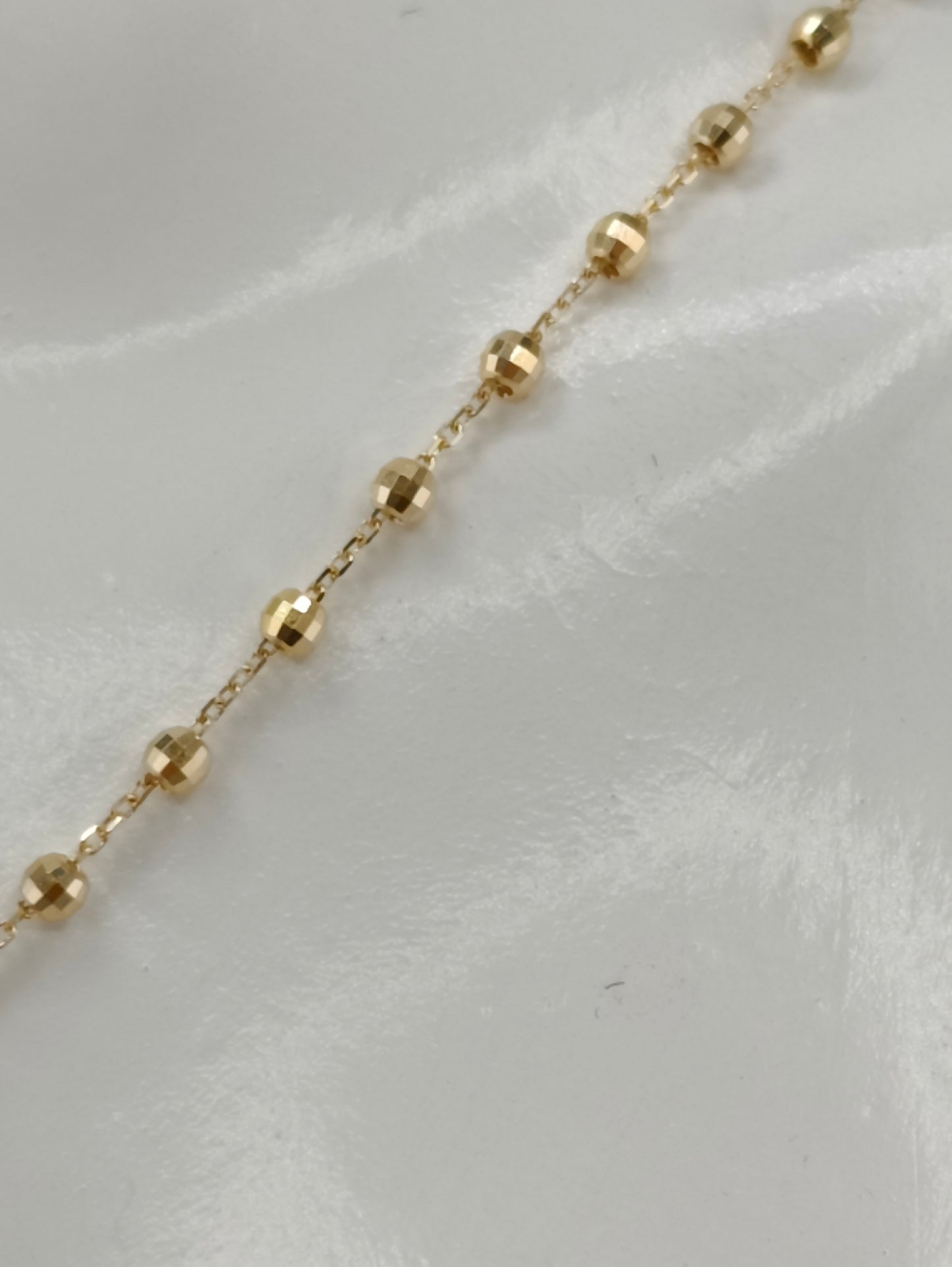 Rosary of vice-shaped spheres